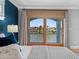 Waterfront view from the main bedroom, showcasing the water access and nearby homes at 11260 7Th E St, Treasure Island, FL 33706