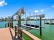 Waterfront boat dock with boat lift and room for multiple boats at 11260 7Th E St, Treasure Island, FL 33706
