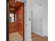Interior elevator features wood paneling and tile floor for easy access between floors at 11260 7Th E St, Treasure Island, FL 33706