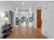 Bright foyer with hardwood floors leading to a spacious living area with water views at 11260 7Th E St, Treasure Island, FL 33706