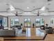 Spacious living room featuring water views, tray ceilings, and hardwood floors at 11260 7Th E St, Treasure Island, FL 33706