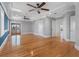 Spacious main bedroom featuring hardwood floors and many windows for natural lighting at 11260 7Th E St, Treasure Island, FL 33706