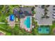 Aerial view of community amenities including a pool, playground, and basketball court at 11325 78Th E St, Parrish, FL 34219