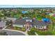 Aerial view of community clubhouse with a pool, playground, and recreational facilities at 11325 78Th E St, Parrish, FL 34219