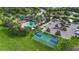 Aerial view of a community pool, playground, and basketball court at 11325 78Th E St, Parrish, FL 34219