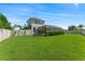 Spacious back yard with a privacy fence and screened-in patio at 11325 78Th E St, Parrish, FL 34219