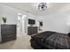 A calming bedroom with dark furniture provides a serene personal retreat at 11325 78Th E St, Parrish, FL 34219