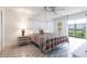 Cozy bedroom with canopy bed, neutral tones, and natural light at 1150 Tarpon Center Dr # 1D, Venice, FL 34285