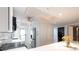Bright, modern kitchen with stainless steel appliances and sleek countertops at 1150 Tarpon Center Dr # 1D, Venice, FL 34285