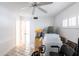 Bright storage room with clear plastic containers, tiled floor, and ample space for organizing household items at 1150 Tarpon Center Dr # 1D, Venice, FL 34285