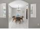 Elegant dining room featuring stylish decor, modern lighting, and a cozy atmosphere for gatherings at 11835 Shrewsbury Ln, Parrish, FL 34219
