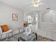 Inviting living room with tile floors, neutral walls, and an open layout for comfortable living at 11835 Shrewsbury Ln, Parrish, FL 34219