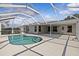 A backyard pool and patio area that's ideal for relaxation and outdoor entertainment at 11835 Shrewsbury Ln, Parrish, FL 34219