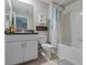 Well-maintained bathroom featuring a combination shower and tub, and a stylish vanity at 11916 Castine St, New Port Richey, FL 34654
