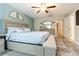 Beautiful bedroom with stylish decor, a comfortable bed, and ample natural light at 11916 Castine St, New Port Richey, FL 34654