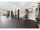 Well-equipped fitness center featuring modern exercise machines and weights, providing residents with convenient workout options at 11916 Castine St, New Port Richey, FL 34654