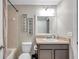This bathroom features decor art and a large vanity at 12025 Greengate Dr, Hudson, FL 34669