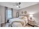 Comfortable bedroom featuring soft lighting and a cozy atmosphere at 12025 Greengate Dr, Hudson, FL 34669