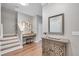 Inviting entryway features wood floors, staircase, and stylish decor for a warm welcome at 12025 Greengate Dr, Hudson, FL 34669