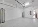 Two car garage with ample space and a new water heater at 12025 Greengate Dr, Hudson, FL 34669