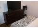 Bedroom with large dresser and flat screen TV at 12411 Brookside St, Spring Hill, FL 34609