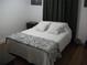 The cozy bedroom includes a comfortable bed and modern design at 12411 Brookside St, Spring Hill, FL 34609