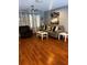 Cozy living room featuring hardwood floors, modern furniture, and stylish decor at 12411 Brookside St, Spring Hill, FL 34609
