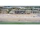 This aerial shows the proximity of the building to the beach and surrounding waterfront properties and community at 14300 Gulf Blvd # 104, Madeira Beach, FL 33708