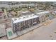 This aerial shows the multi-story building has great beach access, convenient for residents and vacationers at 14300 Gulf Blvd # 104, Madeira Beach, FL 33708