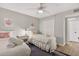 Comfortable guest bedroom featuring twin beds and ample closet space at 14300 Gulf Blvd # 104, Madeira Beach, FL 33708