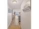 Inviting hallway leading to a bright living area with beach views at 14300 Gulf Blvd # 104, Madeira Beach, FL 33708