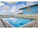 The pool is surrounded by ample seating, enhanced by the building's waterfront location at 14300 Gulf Blvd # 104, Madeira Beach, FL 33708