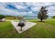 Grill and picnic table near the lake at 1601 Fox Grape Loop, Lutz, FL 33558