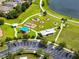 Aerial view of the community playground with covered seating area and ample parking at Long Lake Ranch at 1601 Fox Grape Loop, Lutz, FL 33558