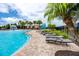 Inviting poolside with lounge chairs overlooking the zero entry pool at Long Lake Ranch at 1601 Fox Grape Loop, Lutz, FL 33558