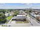 Aerial view of a single-Gathering home, featuring a large lot and convenient location near the city at 1701 N Tampania Ave, Tampa, FL 33607