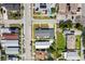 An overhead view of the home's boundary lines in the surrounding neighborhood at 1701 N Tampania Ave, Tampa, FL 33607