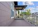 Charming covered front porch, perfect for relaxing and enjoying the neighborhood ambiance at 1701 N Tampania Ave, Tampa, FL 33607