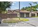 Charming townhouse with a two-car garage, a fenced yard, and a well-maintained exterior at 2095 Sunset Point Rd # 2201, Clearwater, FL 33765