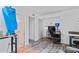 Bright living room with wood-look floors, offering ample space for relaxation and entertainment at 2095 Sunset Point Rd # 2201, Clearwater, FL 33765