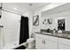 Updated bathroom with walk-in shower, sleek fixtures, and modern vanity at 2513 Sunray Venus Way, Ruskin, FL 33570