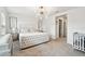 Spacious bedroom with neutral décor, modern lighting, and an open layout at 2513 Sunray Venus Way, Ruskin, FL 33570