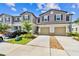 Charming townhomes boast attached garages, nicely landscaped yards, and neutral exteriors at 2513 Sunray Venus Way, Ruskin, FL 33570