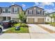 Charming townhomes boast attached garages, nicely landscaped yards, and neutral exteriors at 2513 Sunray Venus Way, Ruskin, FL 33570