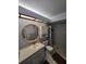 Bathroom with shower/tub combo, large mirror and vanity at 2685 Sabal Springs Cir # 202, Clearwater, FL 33761