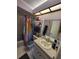 Bathroom featuring a shower/tub combo and updated vanity at 2685 Sabal Springs Cir # 202, Clearwater, FL 33761