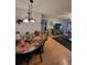 Dining room with chandelier, wood floors and laminate flooring at 2685 Sabal Springs Cir # 202, Clearwater, FL 33761