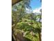 Relaxing view of lake from enclosed lanai at 2685 Sabal Springs Cir # 202, Clearwater, FL 33761