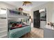 Cozy bedroom featuring a unique bunk bed design, ample natural light, and a spacious closet at 2711 W Trilby Ave, Tampa, FL 33611