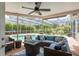 Relaxing screened-in patio with stylish seating and a clear view of the refreshing pool area at 2800 Resnik W Cir, Palm Harbor, FL 34683